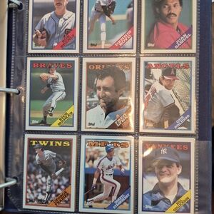 80's and 90's Baseball and Football Cards In Very Good Condition. 2 Binders Full